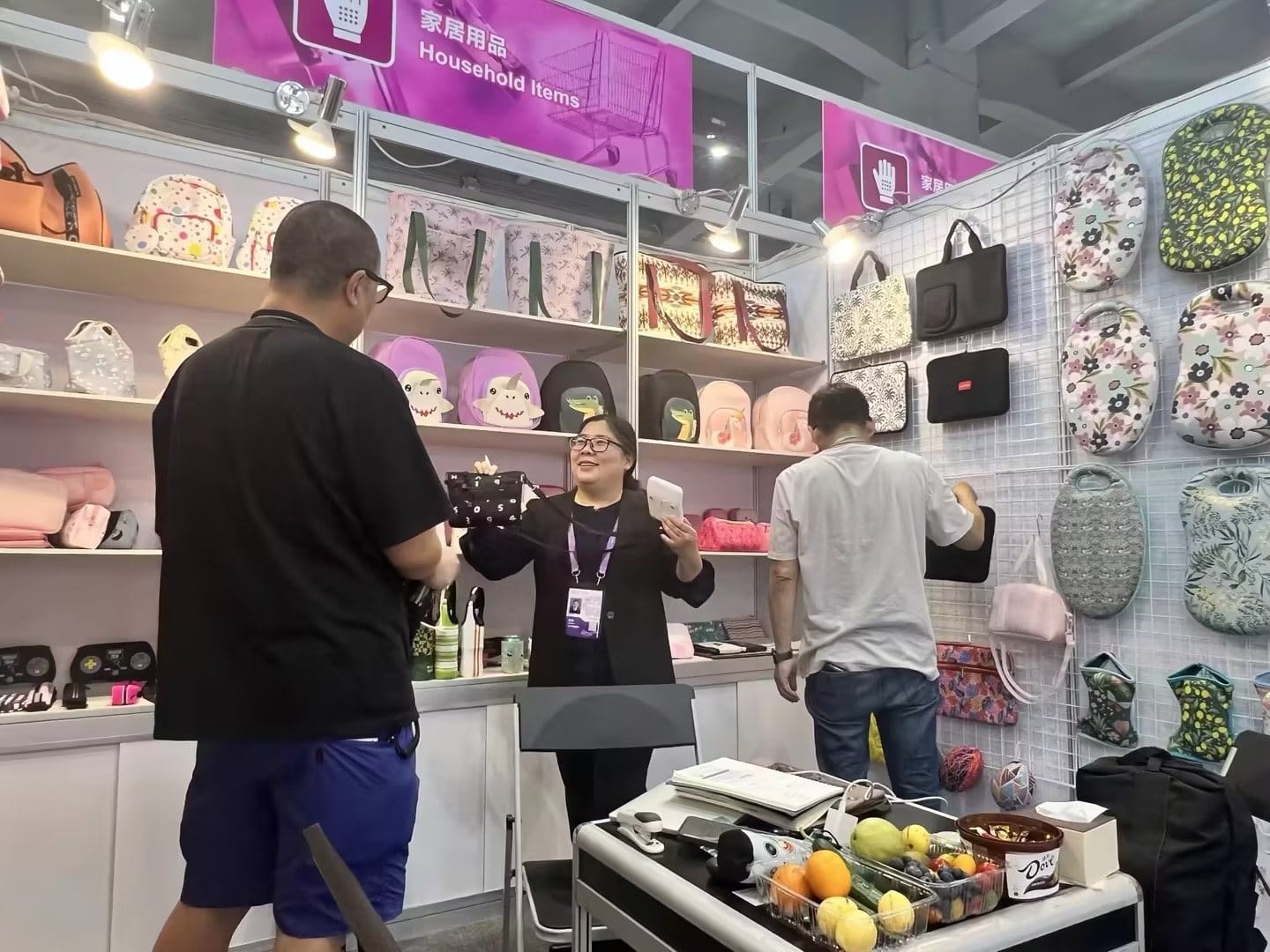 NeoMerc booth discussion for custom neoprene samples