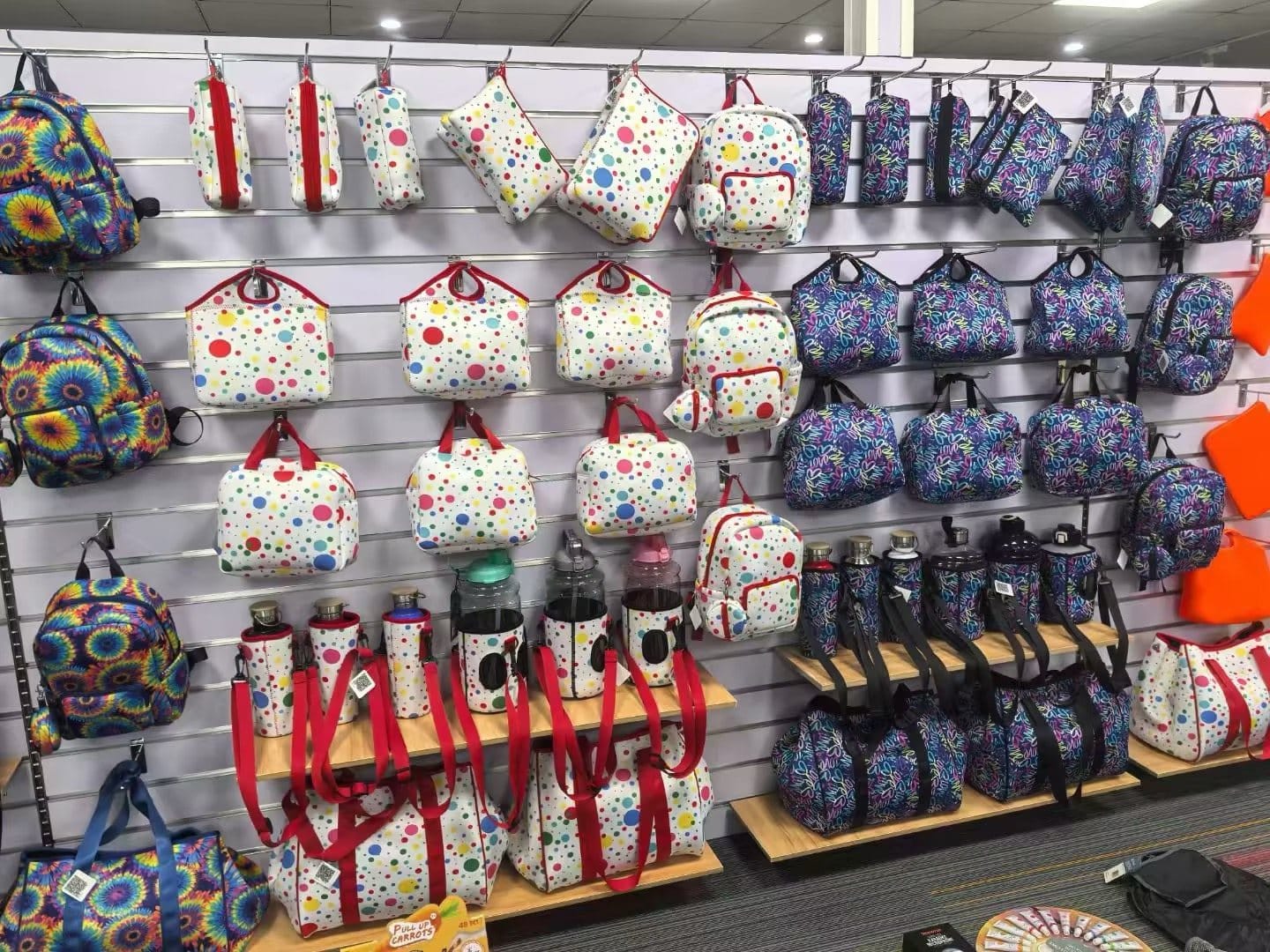 Neoprene backpacks and bags display wall