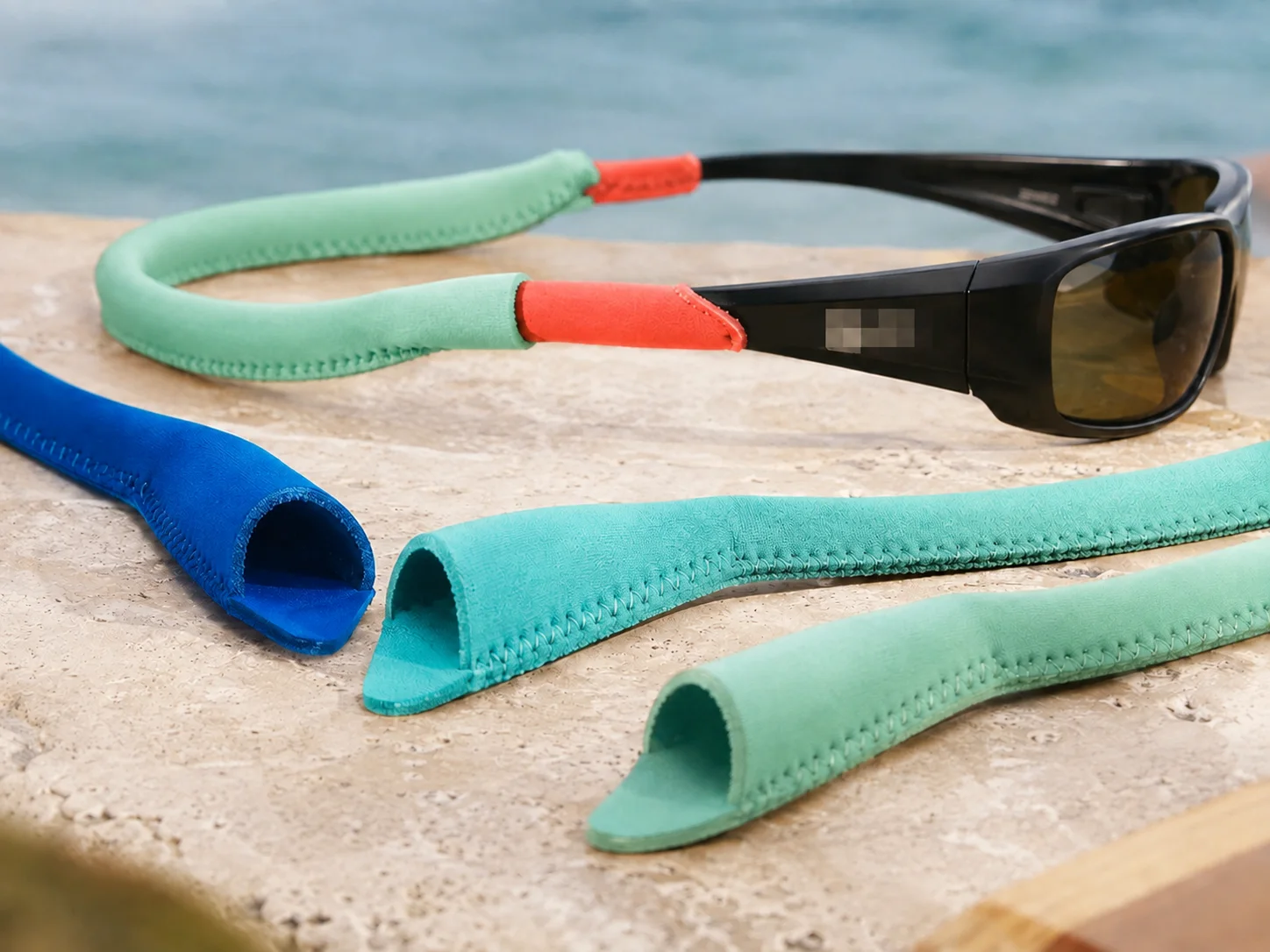 Laser-cut neoprene eyewear retainers developed for a Sydney watersports brand