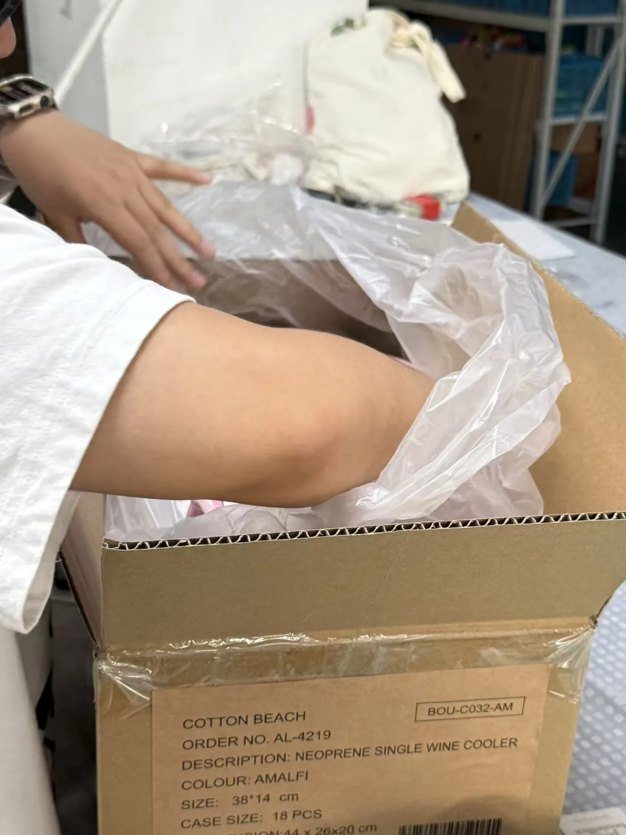 Product packed into carton for shipment preparation